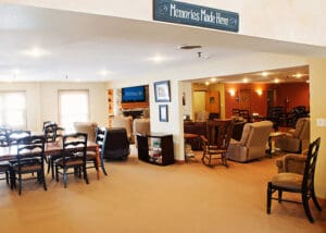 entrance to several rooms with chairs and tables