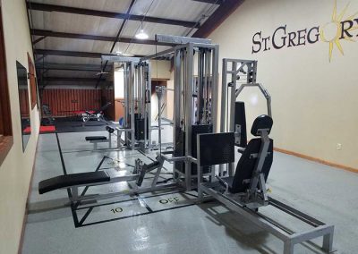 indoor gym with several weight lifting machines