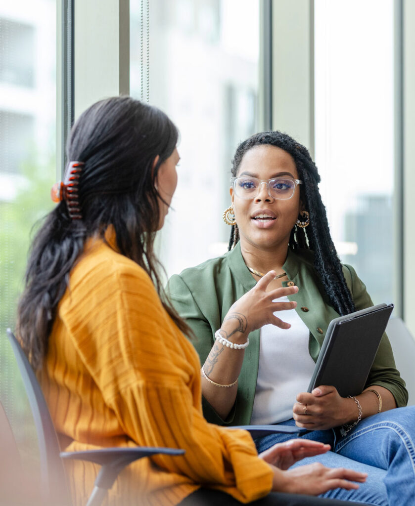 counselor talking with a client in treatment center