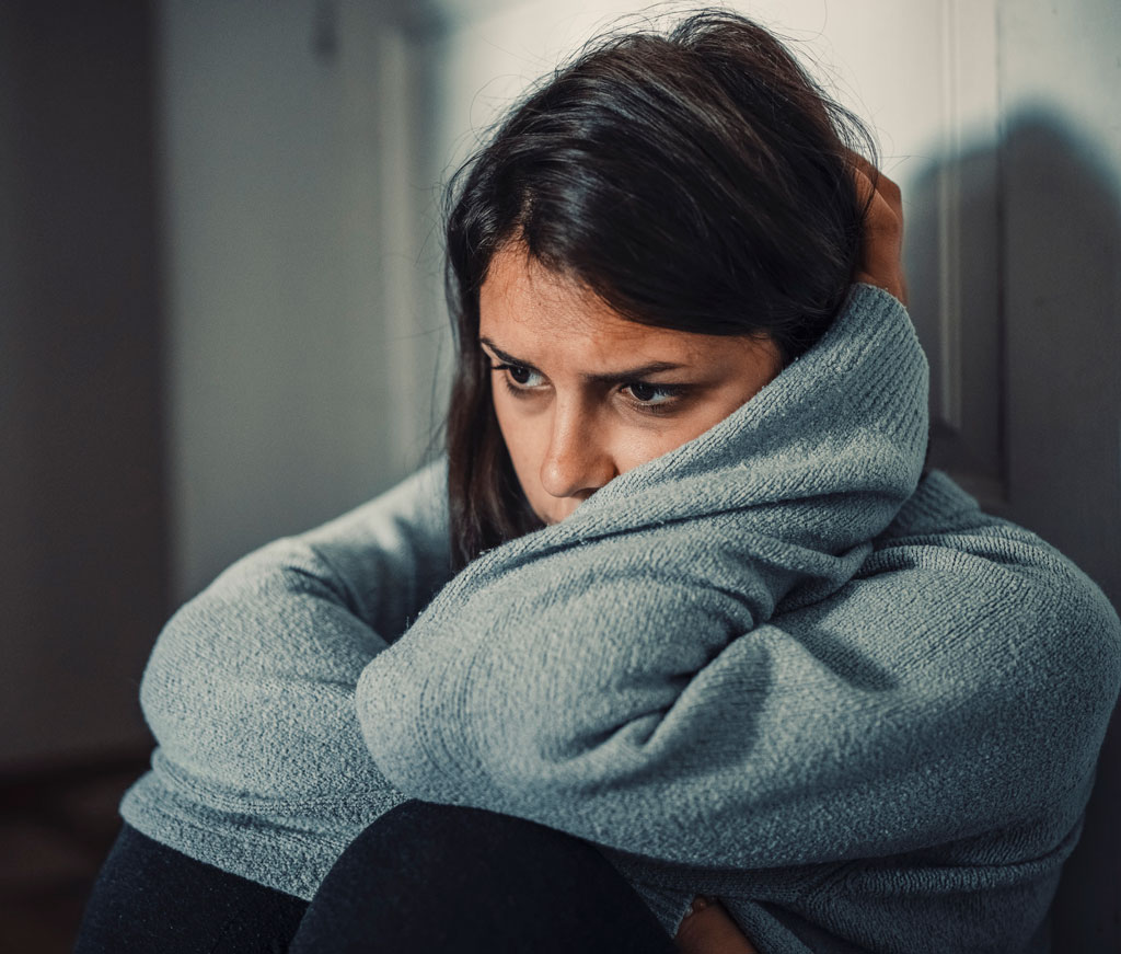 sad distressed woman in contemplation