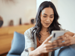 A woman looking at her phone.